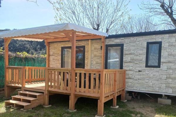 Confort Plus mobile home with wooden terrace at Camping de l'Ardèche Vallon Pont d'Arc